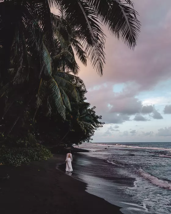 French Polynesia travel guide black sand beach in Tahiti by Dancing the Earth