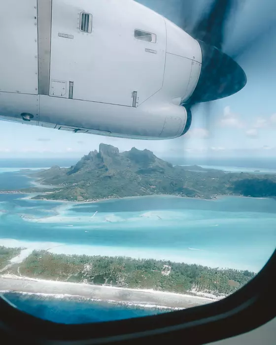 French Polynesia travel guide view over Bora-Bora from the plane by Dancing the Earth