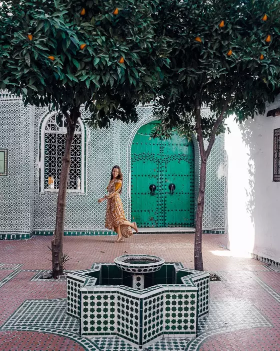 Morocco travel guide Chefchaouen green tiles and orange trees by Dancing the Earth