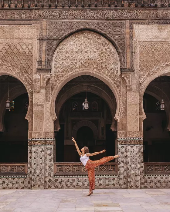 Morocco travel guide Fes Bou Inania Medersa carved wood and tiles walls by Dancing the Earth