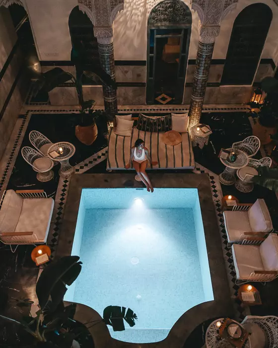 Morocco travel guide Marrakesh Ksar Kasbah riad pool by night from upstairs by Dancing the Earth