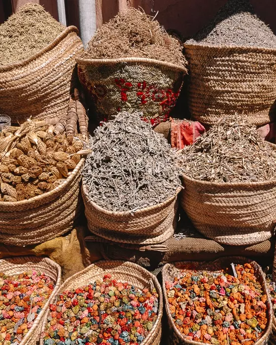 Spices stall in Marrakesh by Dancing the Earth