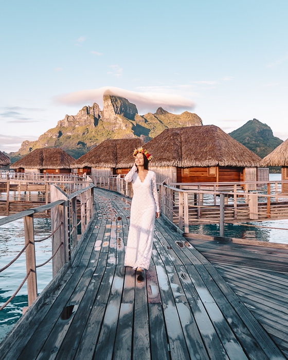 Four Seasons Bora Bora walking at sunrise with Mount Otemanu behind by Dancing the earth