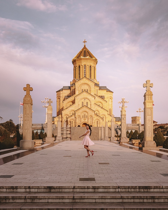 Tbilisi sunset at Sameba Cathedral by Dancing the Earth