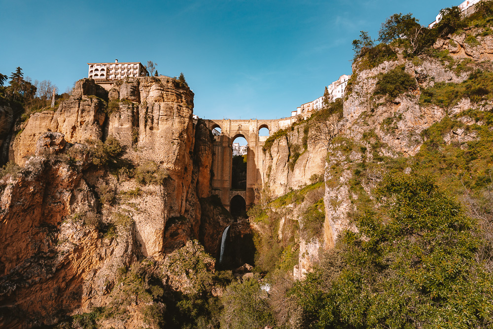Andalusia road-trip itinerary, Ronda bridge and waterfall, by Dancing the Earth