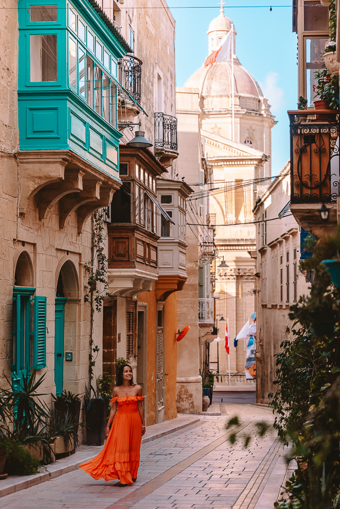 Malta, Birgu street with view on St Lawrence church, by Dancing the Earth