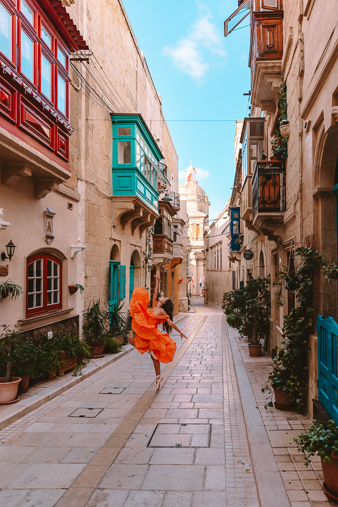 Malta, street of Birgu with view on St Lawrence church, by Dancing the Earth