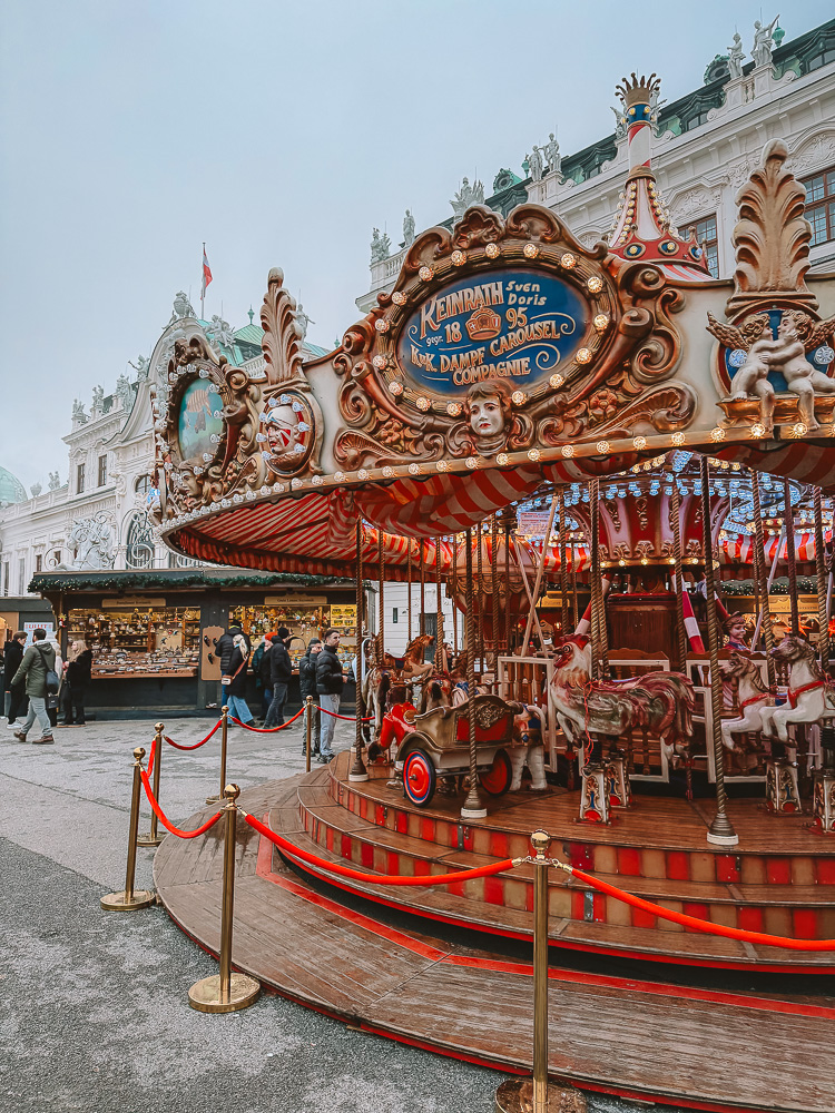 Belvedere Palace christmas market merry-go-round, by Dancing the Earth