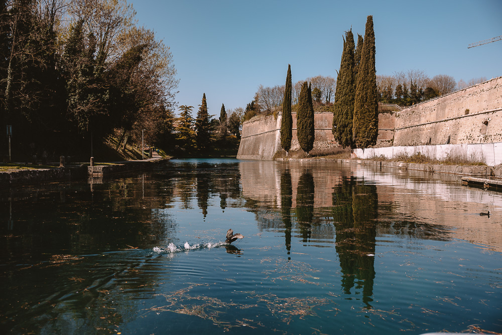 Peschiera del Garda from canal, by Dancing the Earth